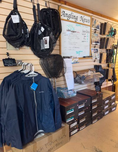 angling news wall Fishing gear and accessories displayed in a store