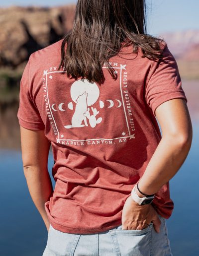 cliffdwellers general store (3) Person wearing Marble Canyon t-shirt by river
