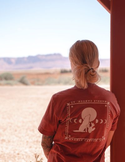 cliffdwellers general store (61) Person in canyon T-shirt admires desert landscape